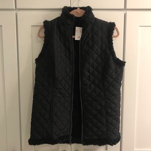Reversible black quilted vest